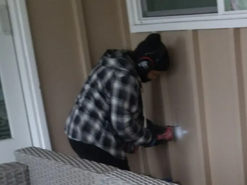 Professional electrician installing an exterior outlet in North Codorus